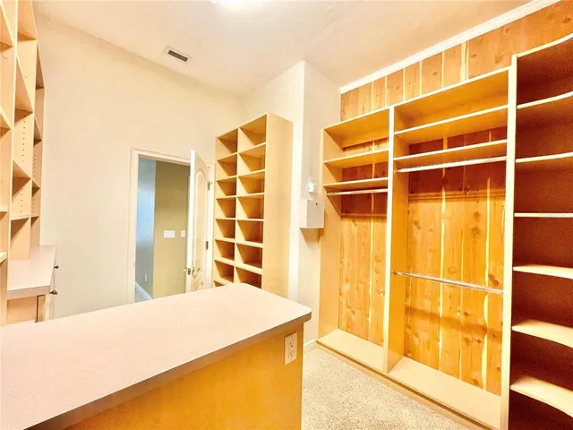 a view of a park with large trees