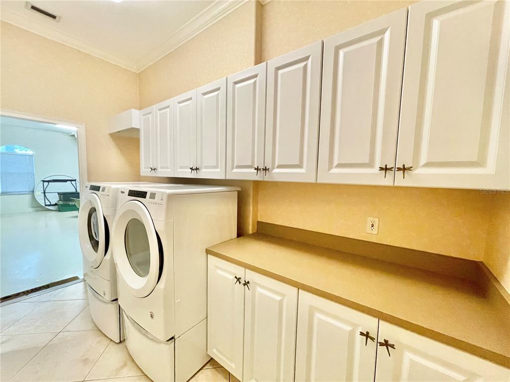 1501 Northwest 98 Street Gainesville, FL 32606 - Photo 70 of 92 a utility room with dryer and washer
