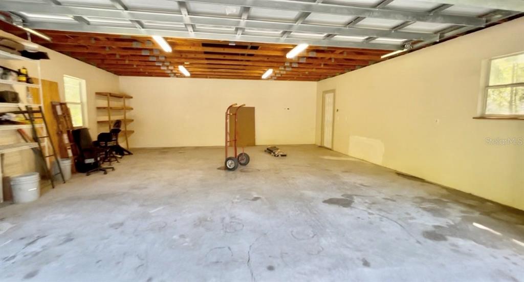 1501 Northwest 98 Street Gainesville, FL 32606 - Photo 75 of 92 a view of a room with gym equipment