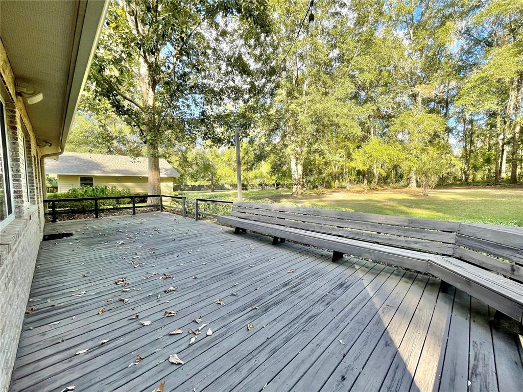 1501 Northwest 98 Street Gainesville, FL 32606 - Photo 92 of 92 a view of outdoor space with deck and living area