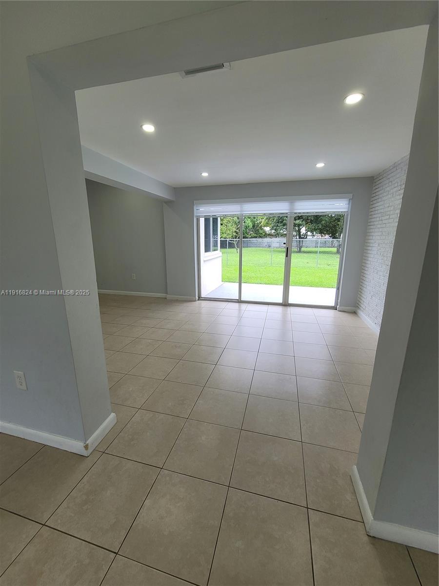 8839 Southwest 28th Street Miami, FL 33165 - Photo 12 of 29 a view of an empty room with a sink and a window