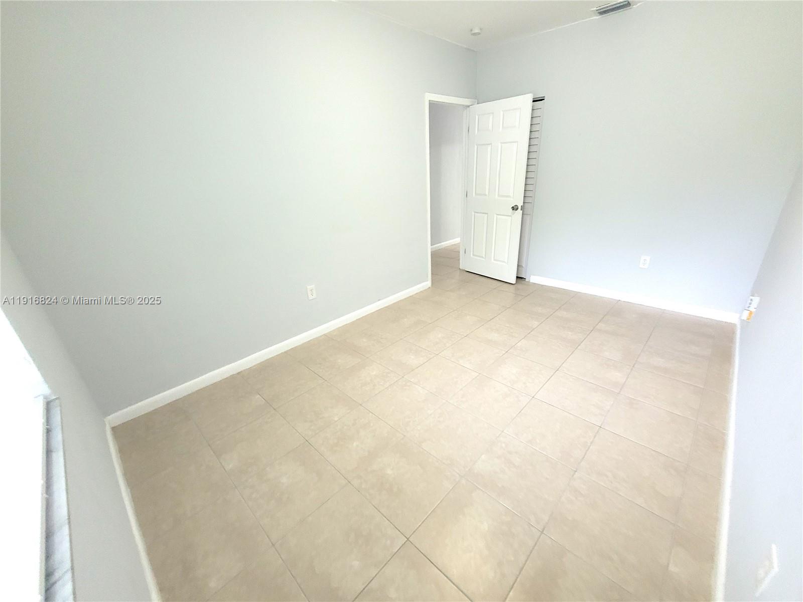 8839 Southwest 28th Street Miami, FL 33165 - Photo 18 of 29 a view of empty room