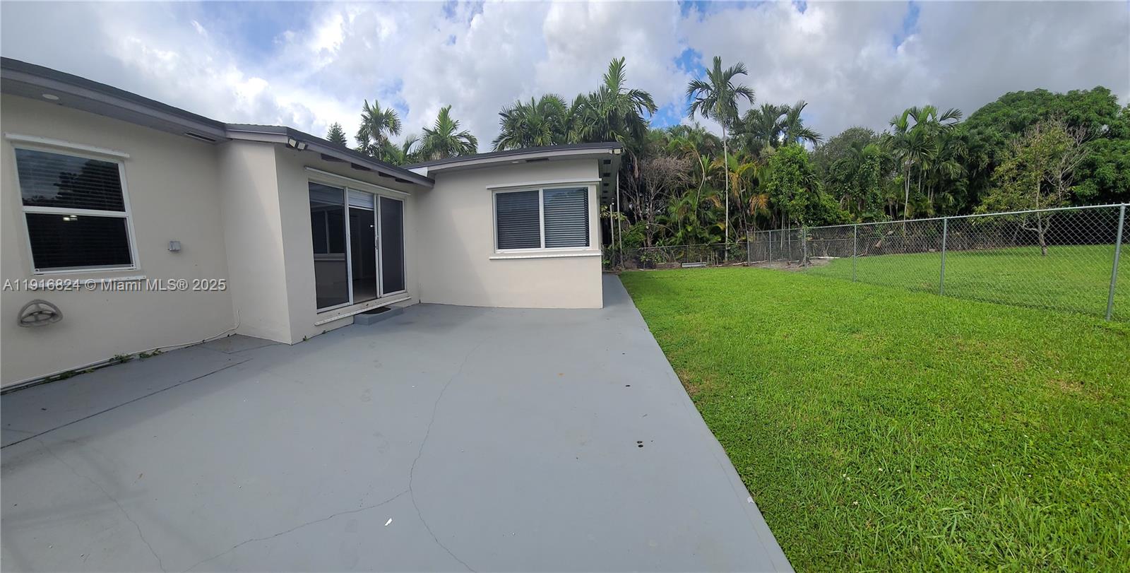 8839 Southwest 28th Street Miami, FL 33165 - Photo 28 of 29 a view of a house with backyard and garden