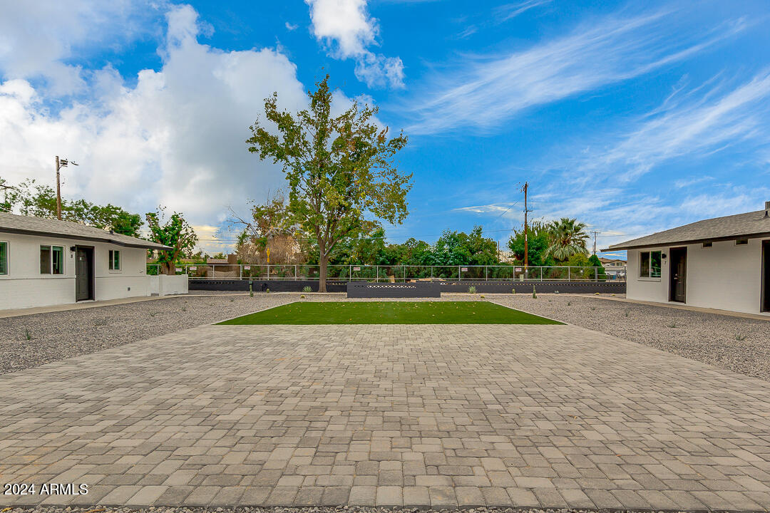 1648 West Colter Street, Unit 2 Phoenix, AZ 85015 - Photo 16 of 17 a view of backyard of house with green space