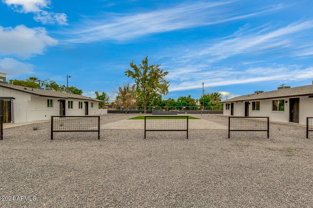 1648 West Colter Street, Unit 2 Phoenix, AZ 85015 - Photo 17 of 17 a view of house with yard and sitting area