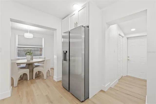a bathroom with a sink a mirror and a shower