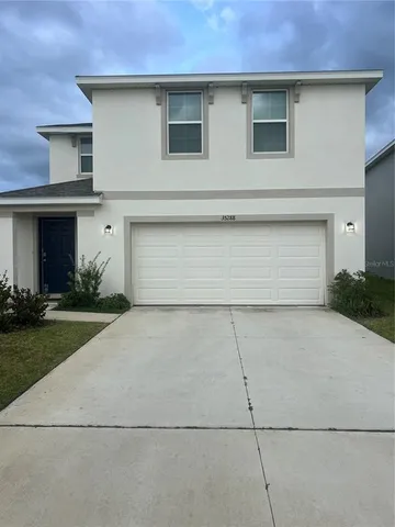 a front view of house with yard