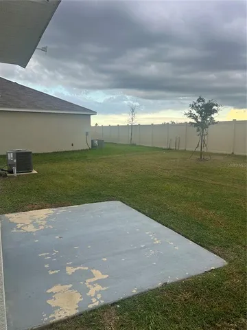 a view of a golf course with a lake