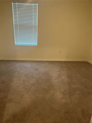 a view of a room with a window