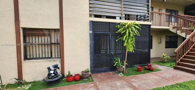 a view of room with wooden floor and window