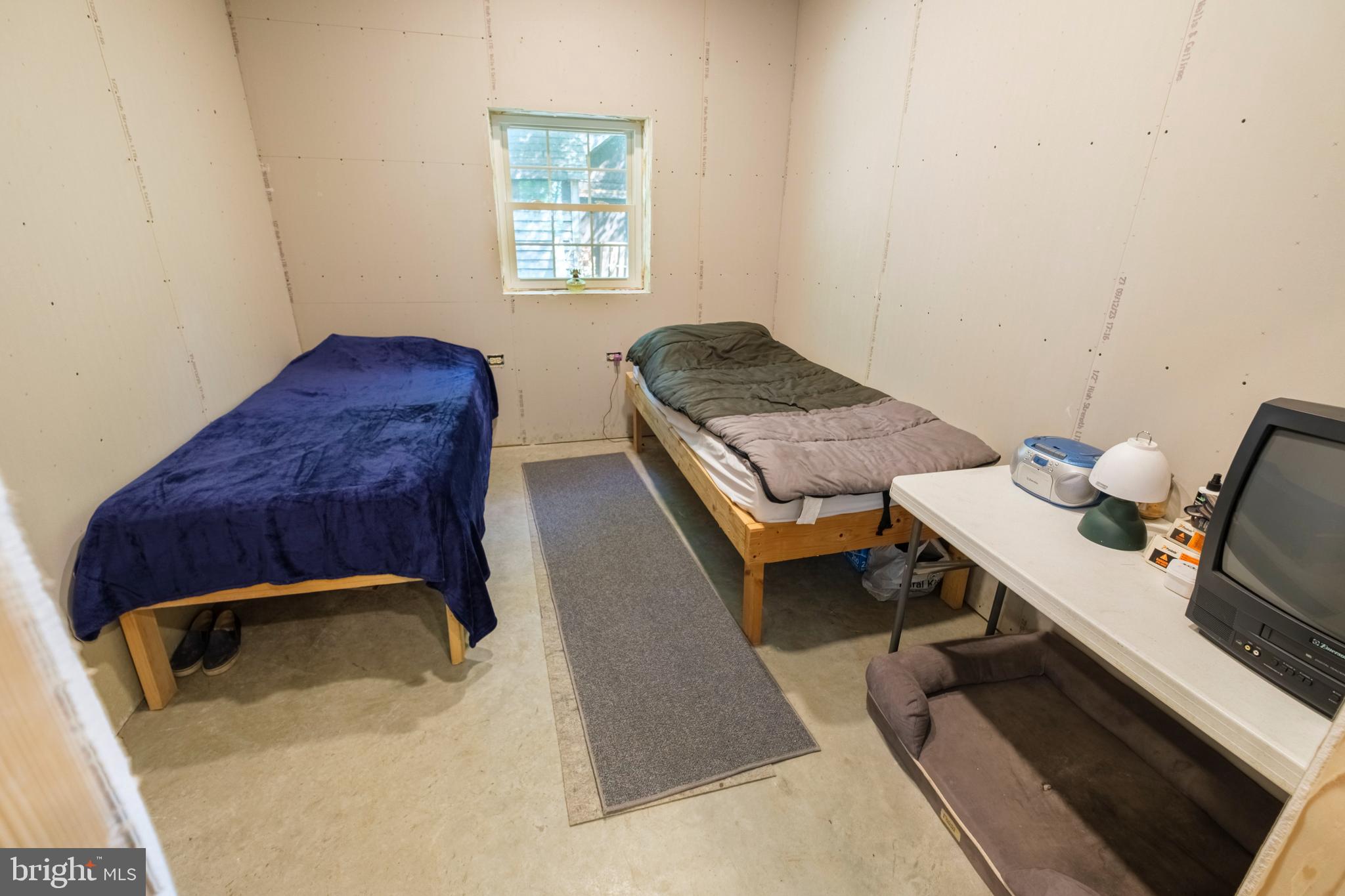 848 Sugar Camp Road Clearfield, PA 16830 - Photo 20 of 54 a living room with a couch and a window