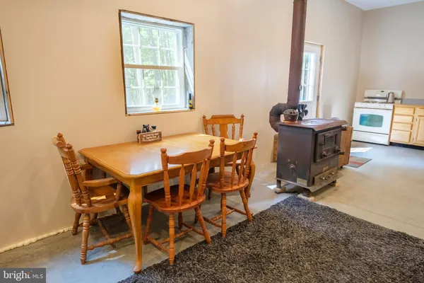 a living room with furniture and window