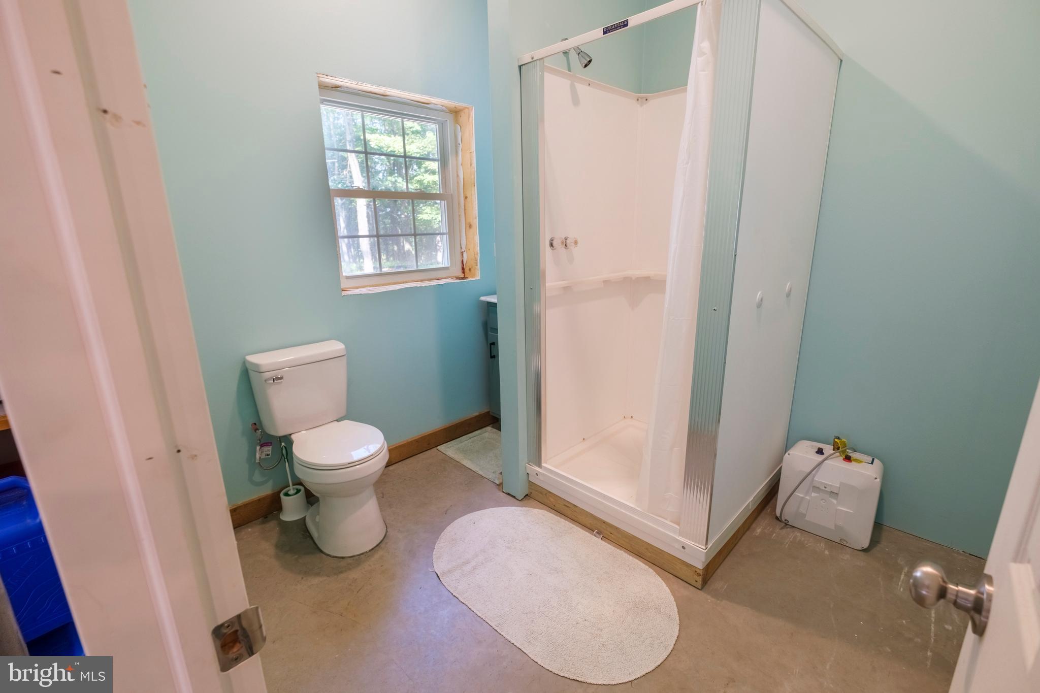 848 Sugar Camp Road Clearfield, PA 16830 - Photo 30 of 54 a bathroom with a toilet and a sink