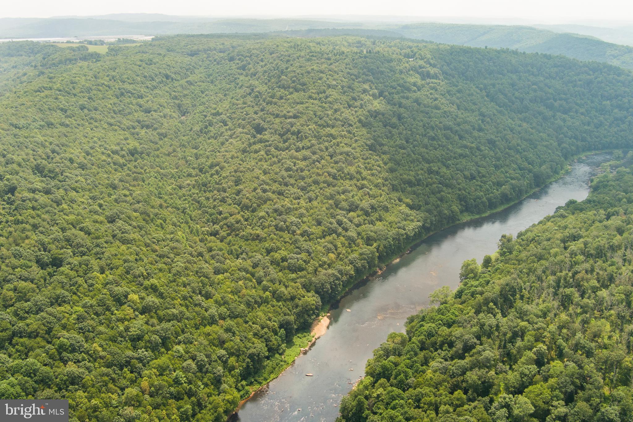 848 Sugar Camp Road Clearfield, PA 16830 - Photo 40 of 54 a view of a lake with a mountain