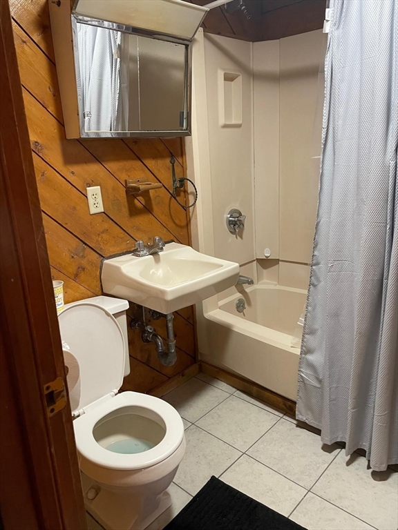 230 Pearl Street, Unit 1 Somerville, MA 02145 - Photo 11 of 11 a bathroom with a sink and a mirror
