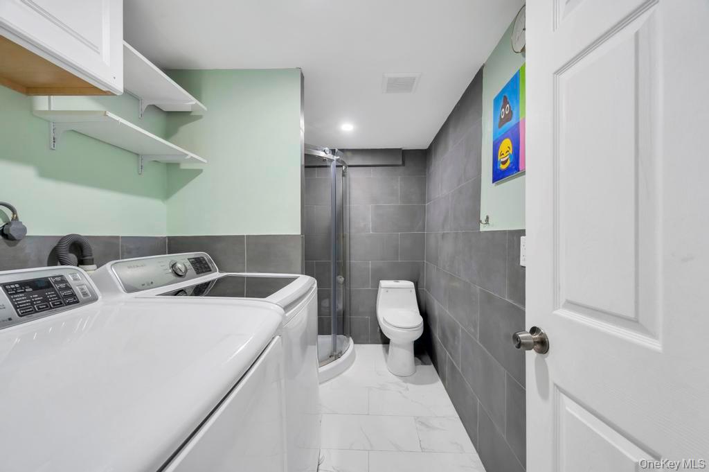 280 Balcom Avenue Bronx, NY 10465 - Photo 15 of 33 Large laundry room & Full Bathroom