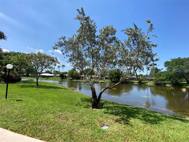 a lake view with a house