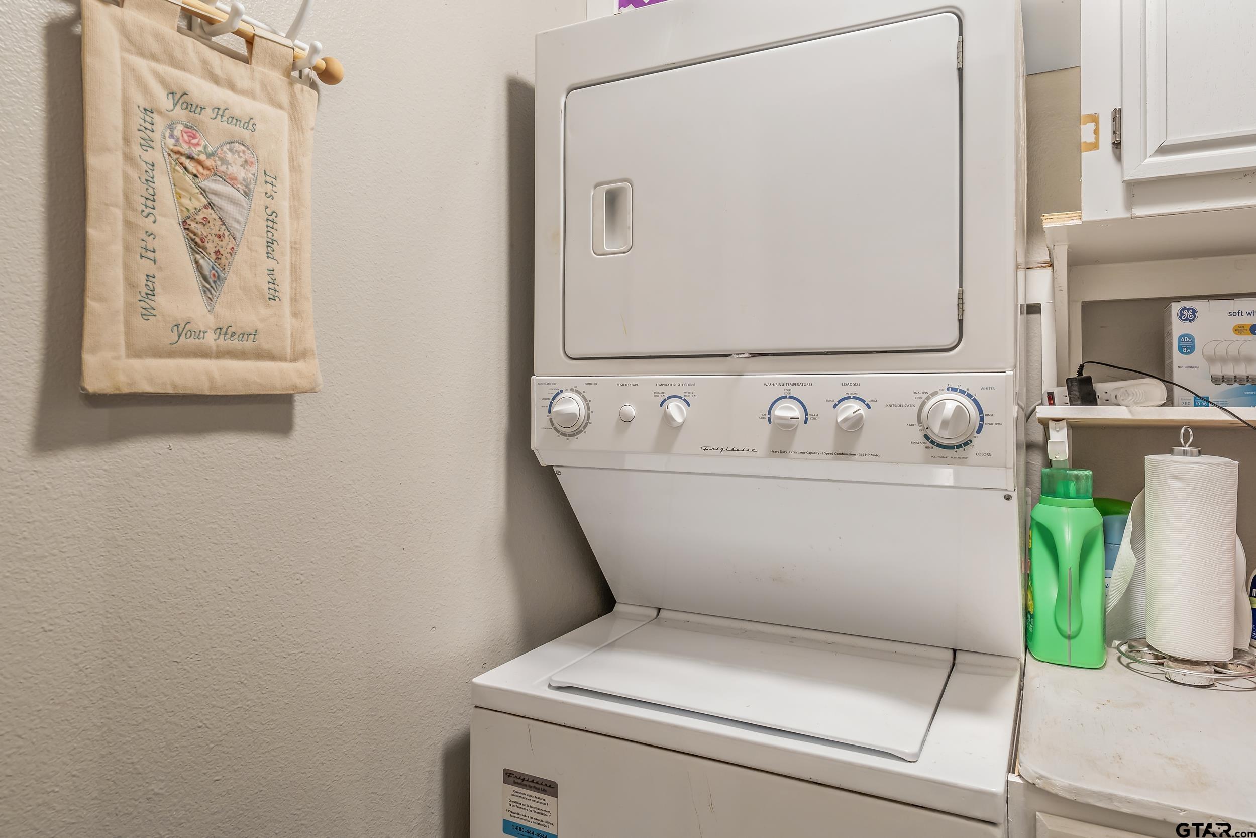 201 Elmwood Lane Holly Lake Ranch, TX 75765 - Photo 16 of 34 a utility room with dryer and washer
