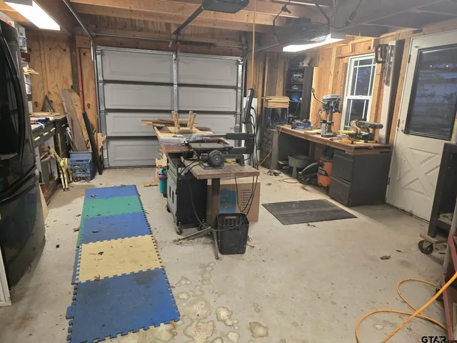 a room with table and chairs