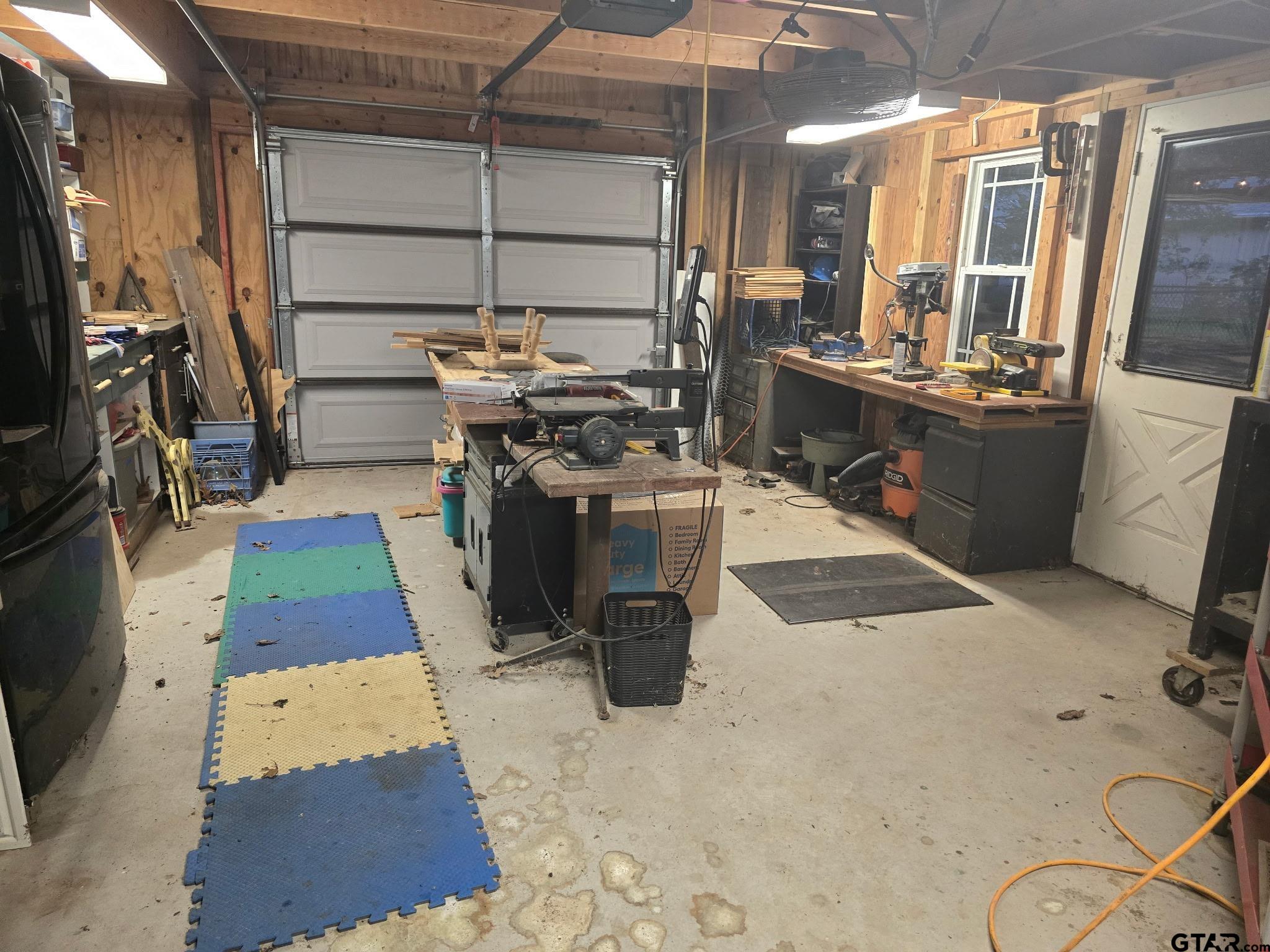 201 Elmwood Lane Holly Lake Ranch, TX 75765 - Photo 24 of 34 a room with table and chairs