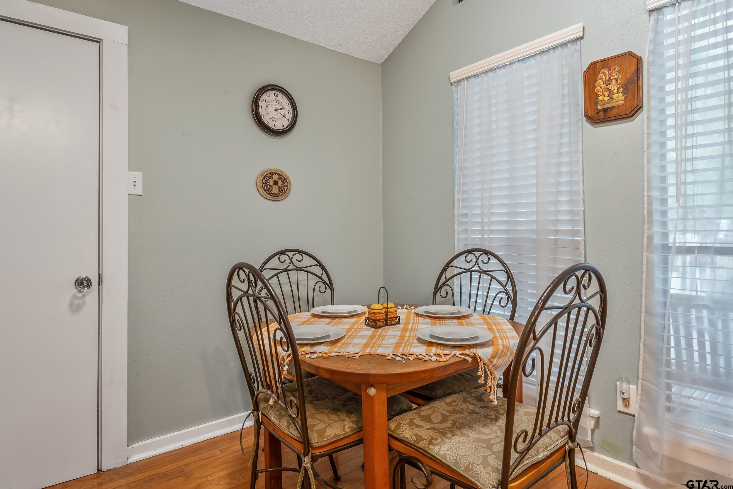 201 Elmwood Lane Holly Lake Ranch, TX 75765 - Photo 9 of 34 a view of a dining area in a house