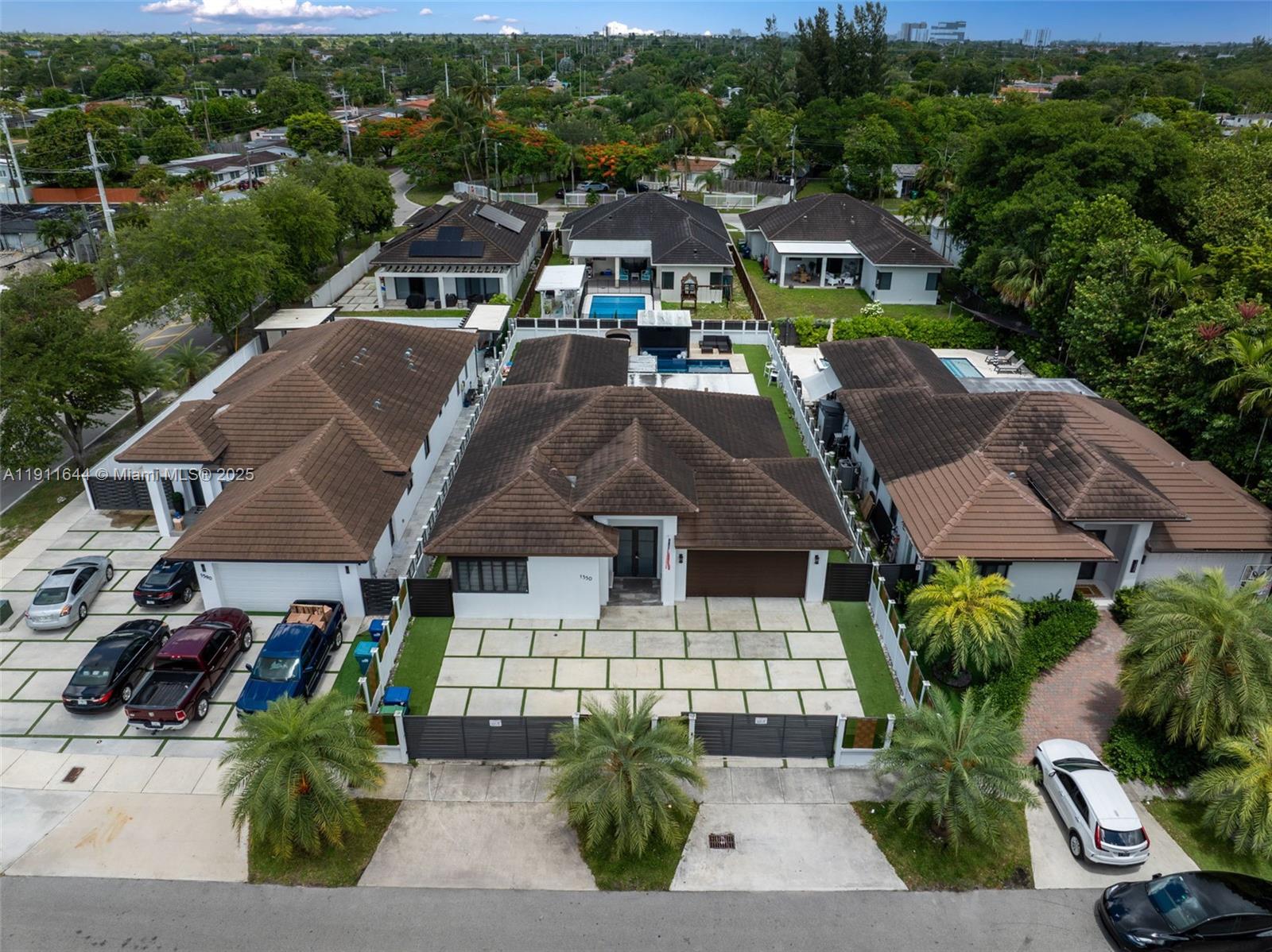 1550 Southwest 89th Court Miami, FL 33174 - Photo 2 of 67 an aerial view of a house with a garden