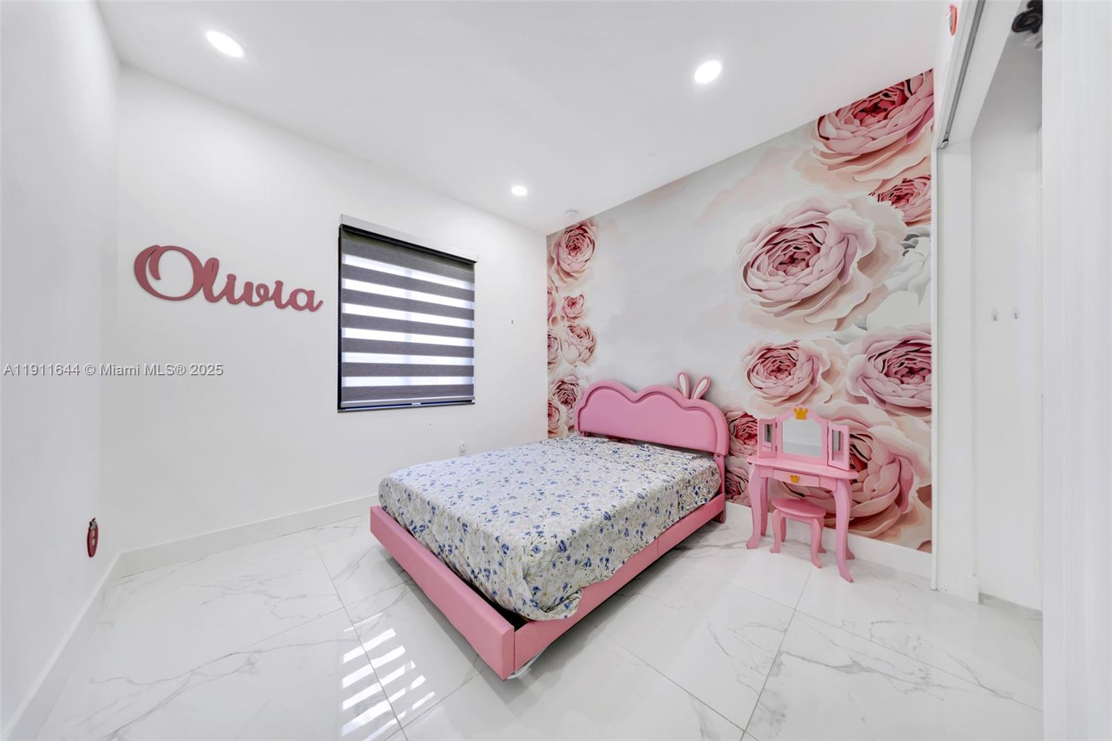 1550 Southwest 89th Court Miami, FL 33174 - Photo 30 of 67 a bedroom with a bed and painting on the wall