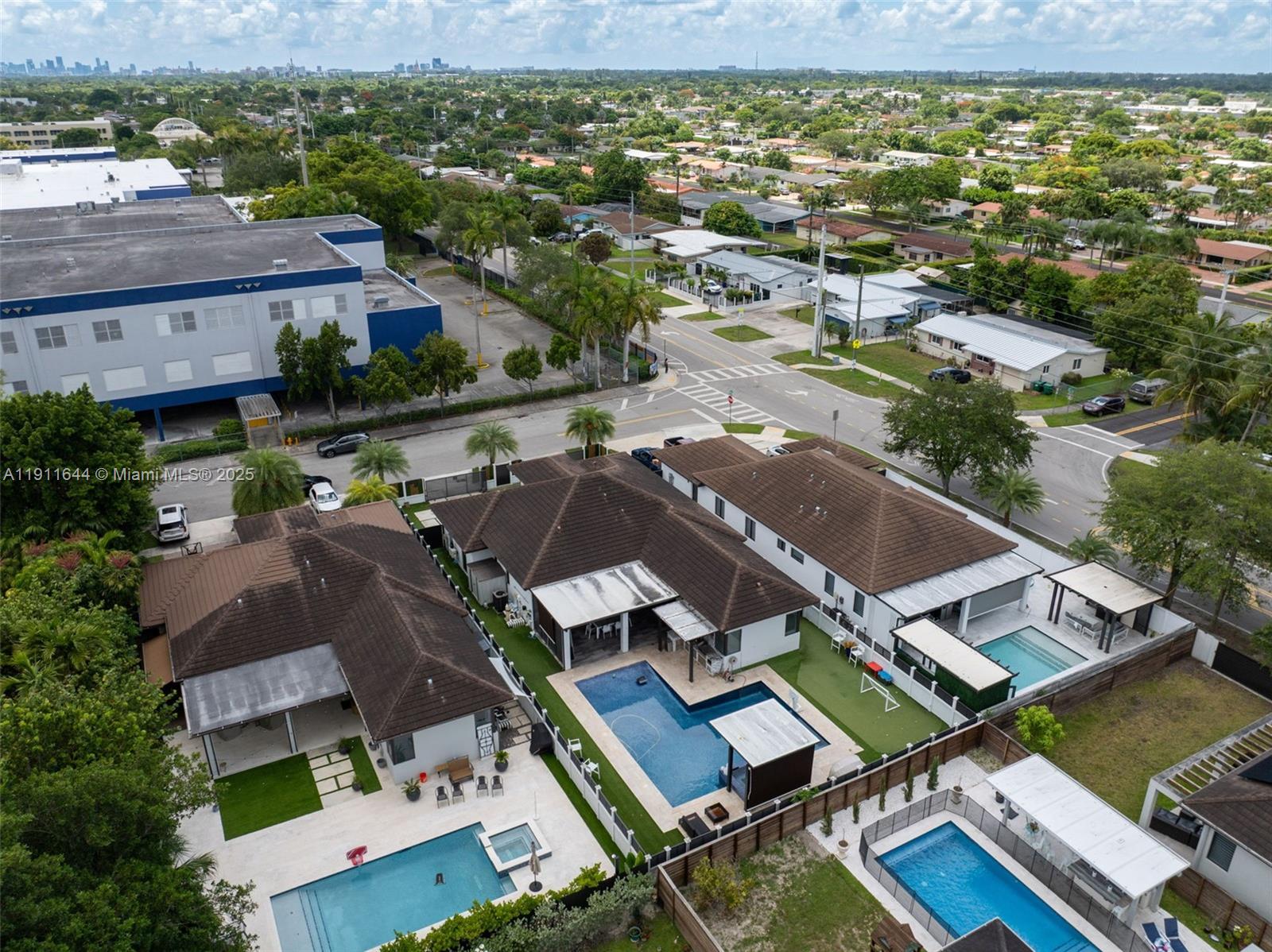 1550 Southwest 89th Court Miami, FL 33174 - Photo 57 of 67 an aerial view of residential houses with outdoor space