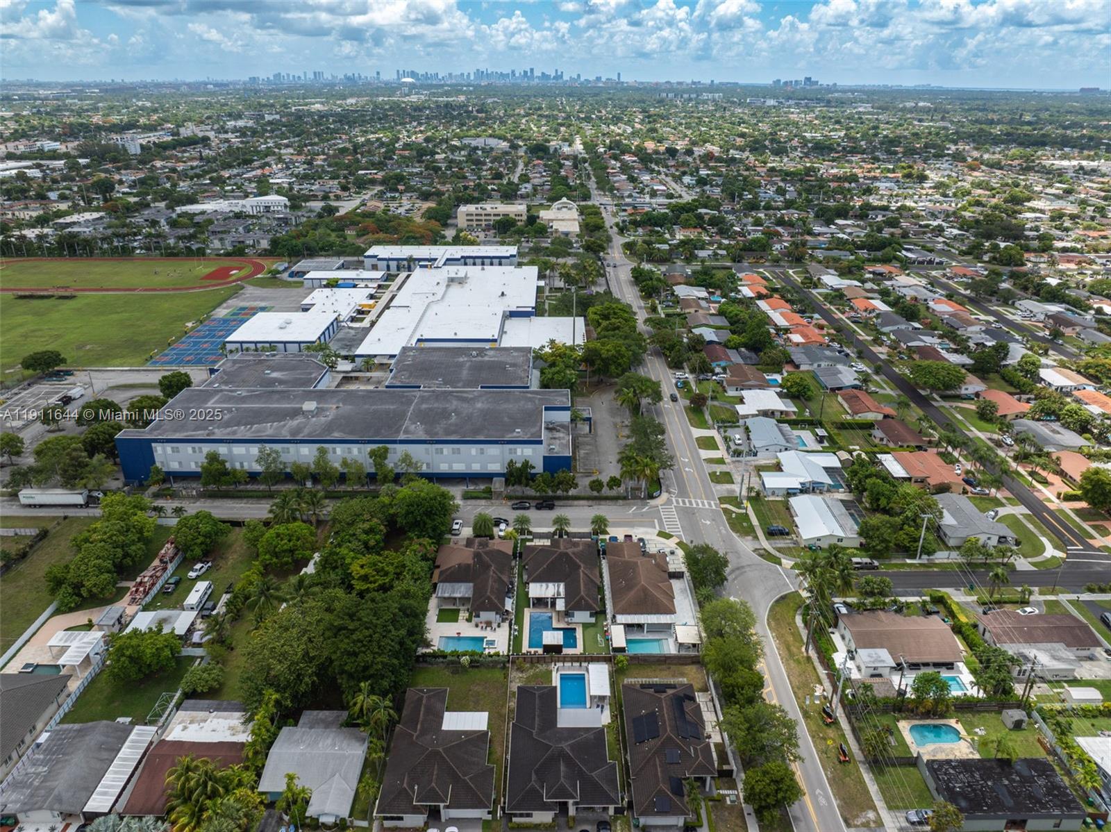 1550 Southwest 89th Court Miami, FL 33174 - Photo 60 of 67 an aerial view of residential houses with outdoor space