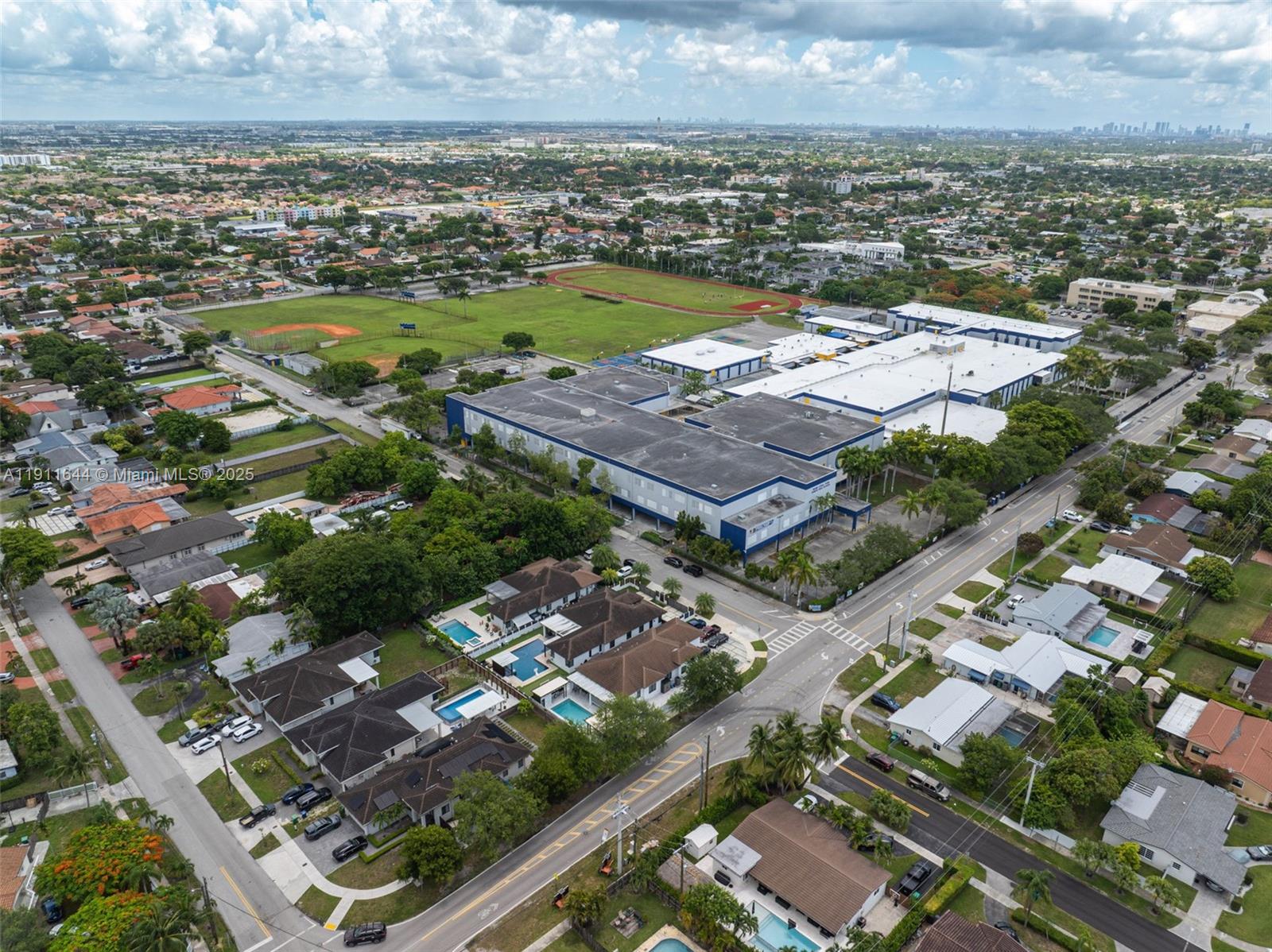 1550 Southwest 89th Court Miami, FL 33174 - Photo 61 of 67 an aerial view of residential houses with outdoor space