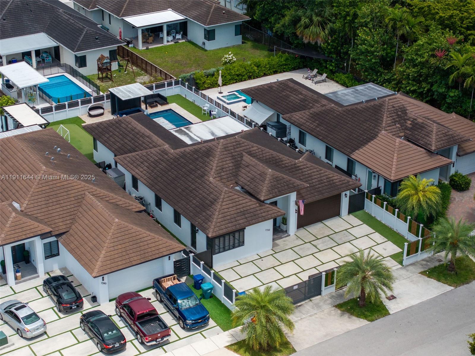 1550 Southwest 89th Court Miami, FL 33174 - Photo 7 of 67 an aerial view of a house with garden space and street view