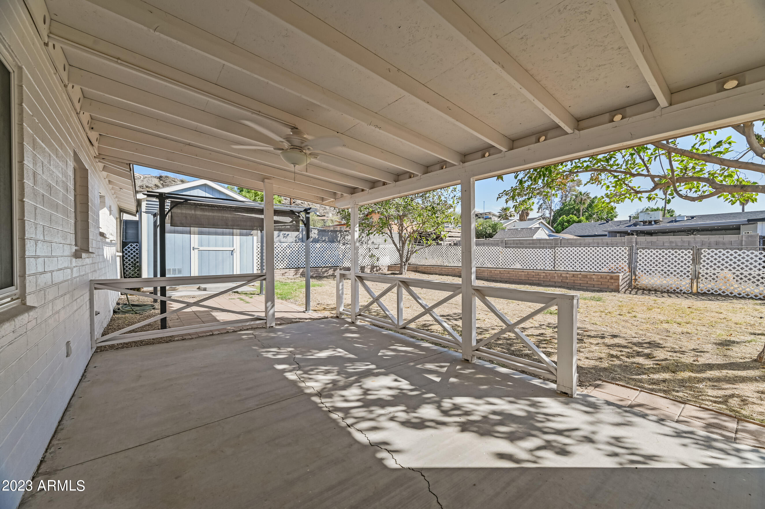 1227 East Las Palmaritas Drive Phoenix, AZ 85020 - Photo 19 of 22 a view of a swimming pool with a patio