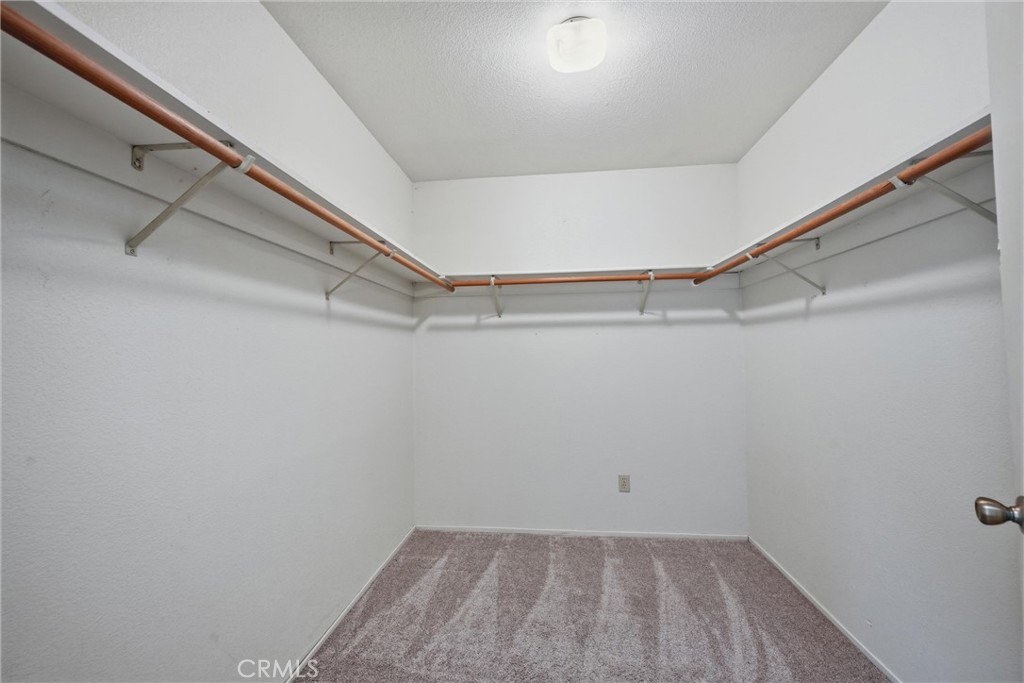 17312 Greenridge Road Hidden Valley Lake, CA 95467 - Photo 18 of 34 a view of a room with racks on the wall
