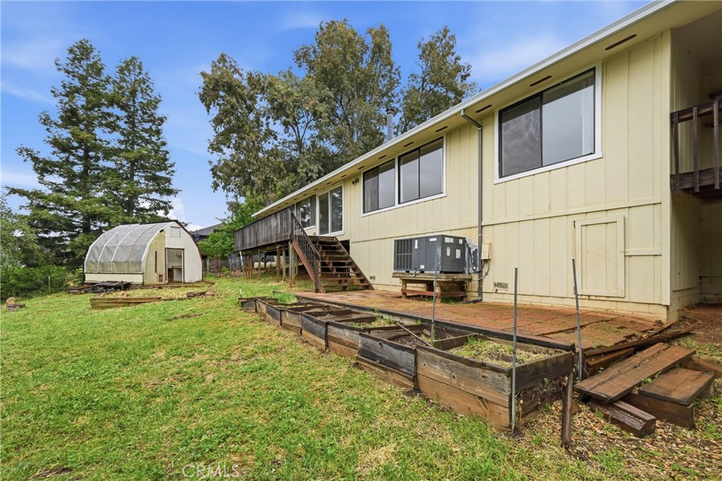 17312 Greenridge Road Hidden Valley Lake, CA 95467 - Photo 28 of 34 a view of a house with backyard and sitting area
