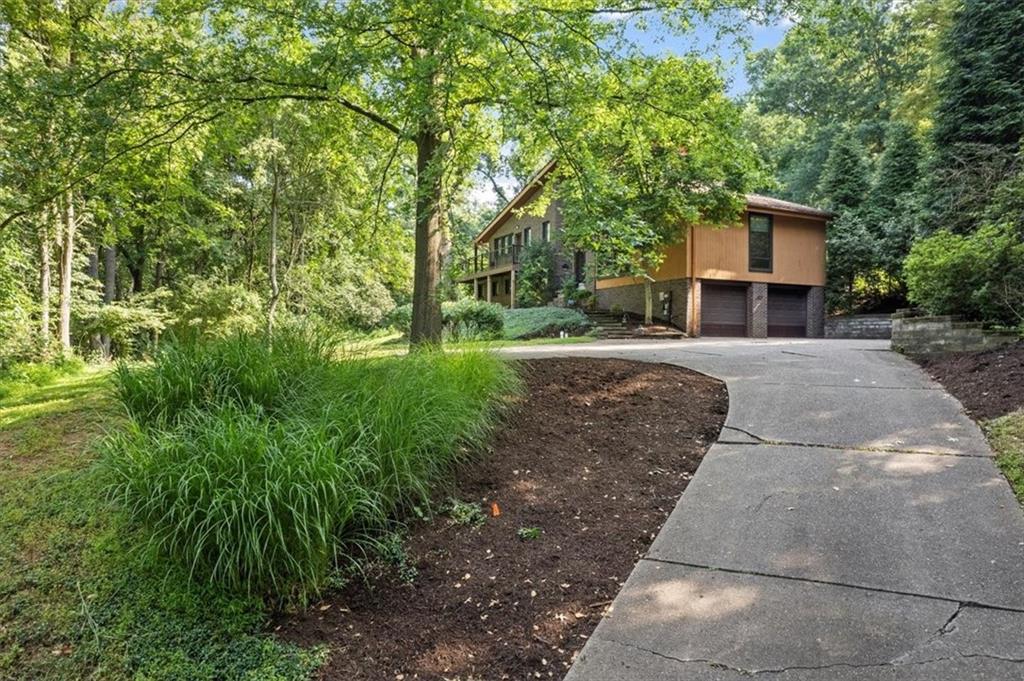 1576 Powers Run Road Pittsburgh, PA 15238 - Photo 33 of 38 Large cement driveway with plenty of parking