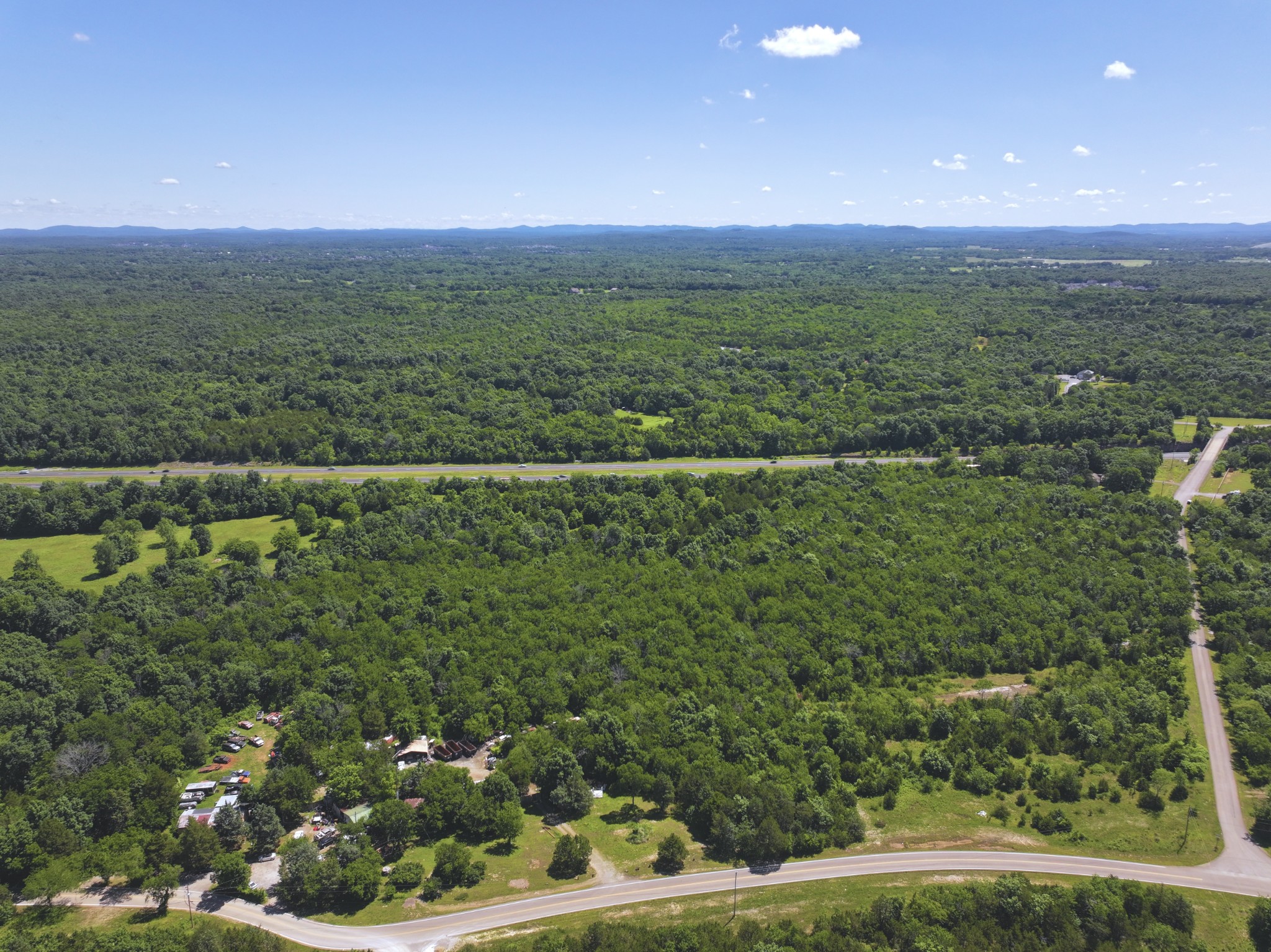 0 Buckeye Bottom Road East Murfreesboro, TN 37129 - Photo 5 of 9 a view of a green field with lots of bushes