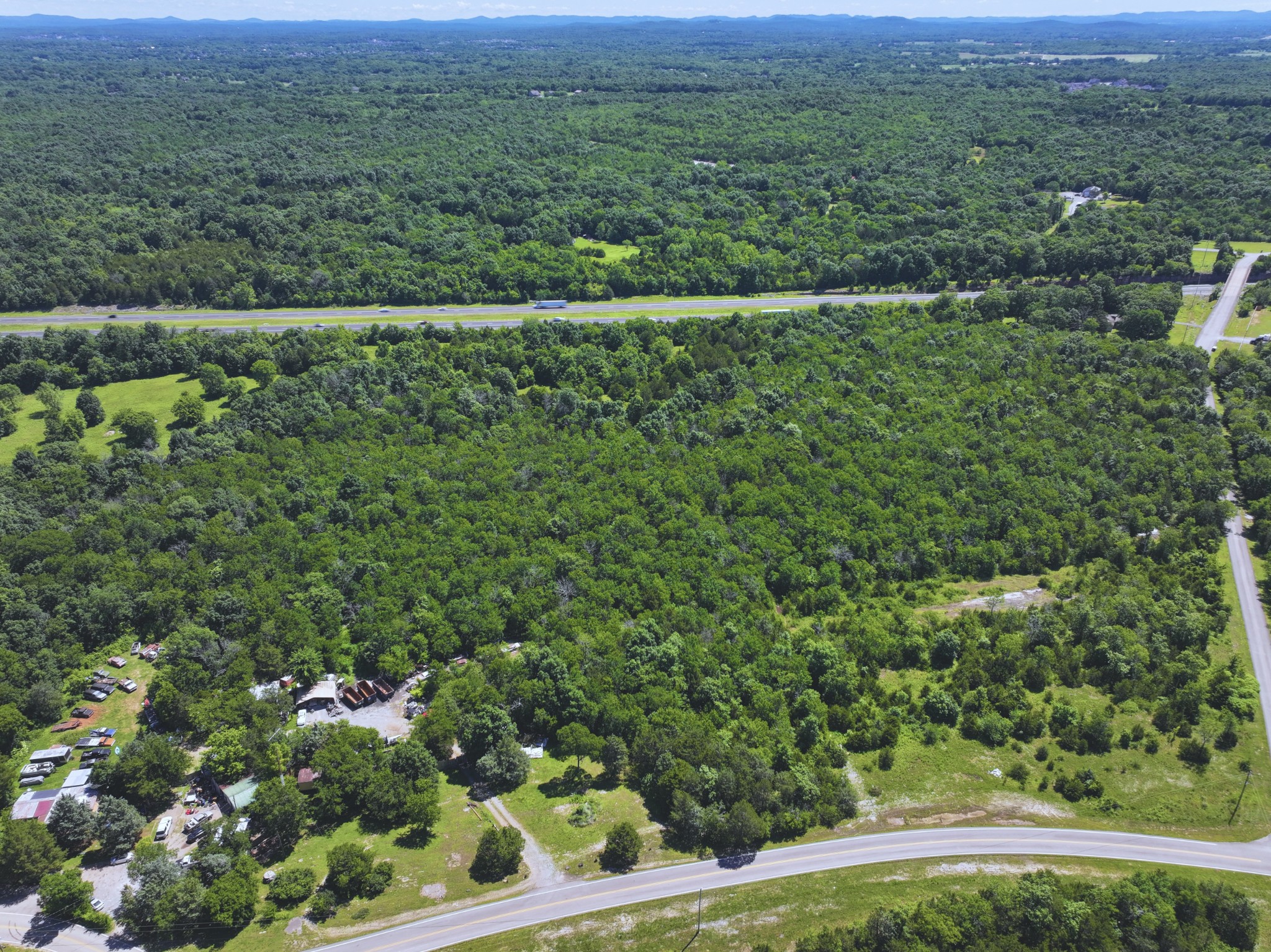 0 Buckeye Bottom Road East Murfreesboro, TN 37129 - Photo 6 of 9 a view of a lush green field