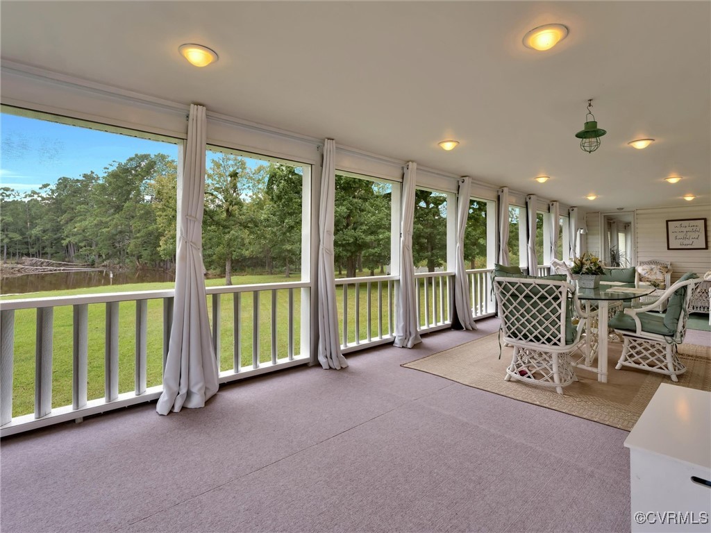 727 Eanes Road Kenbridge, VA 23944 - Photo 24 of 50 a view of a livingroom with furniture and floor to ceiling window