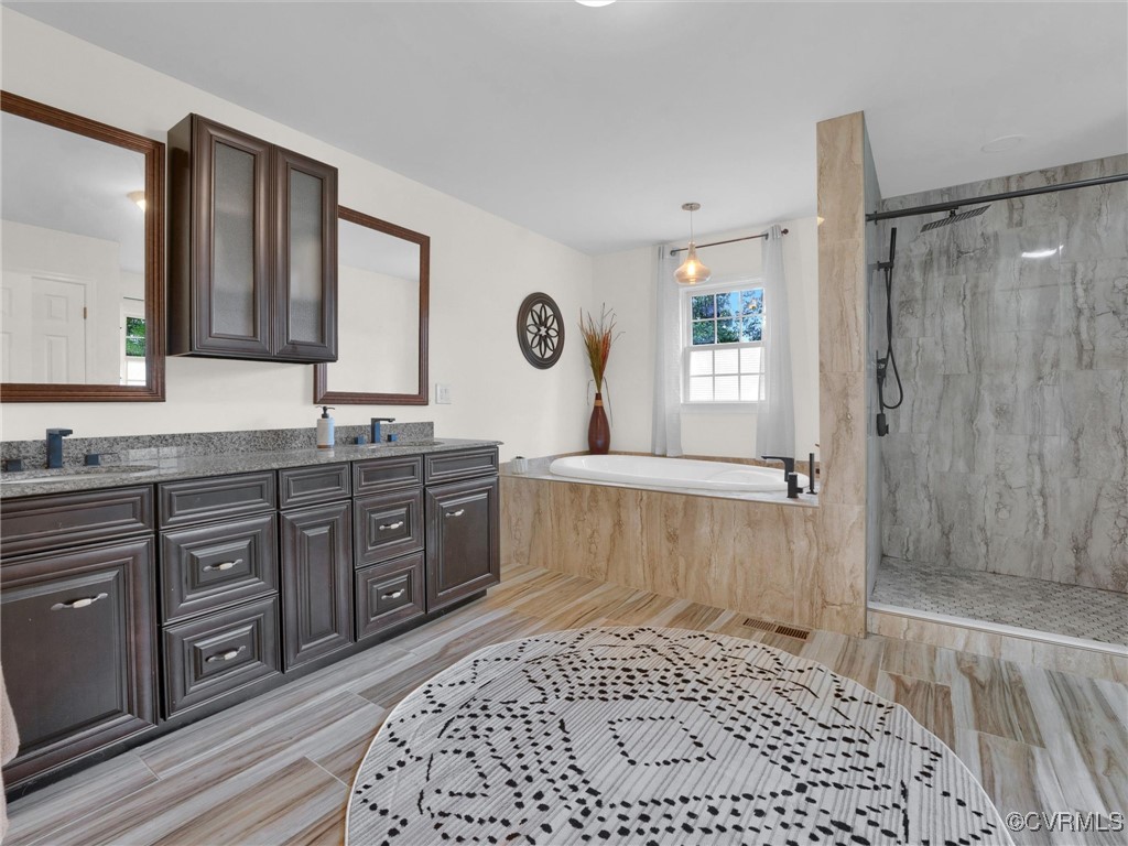 727 Eanes Road Kenbridge, VA 23944 - Photo 27 of 50 a bathroom with a sink a vanity and a mirror