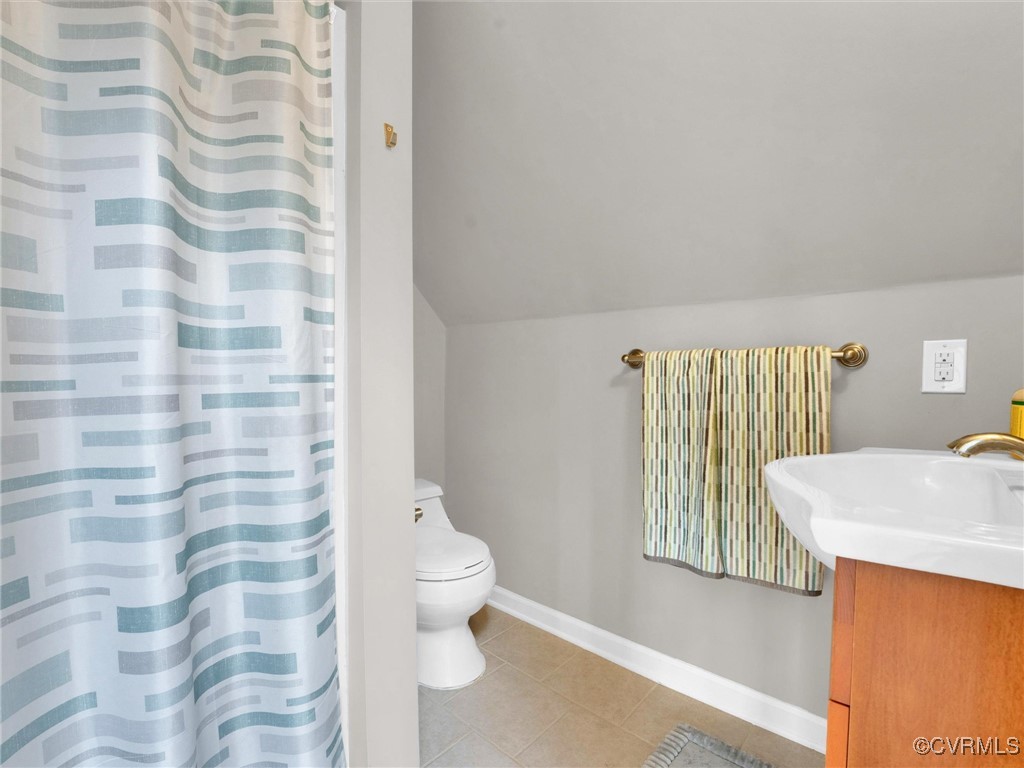 727 Eanes Road Kenbridge, VA 23944 - Photo 42 of 50 a bathroom with a sink toilet and shower