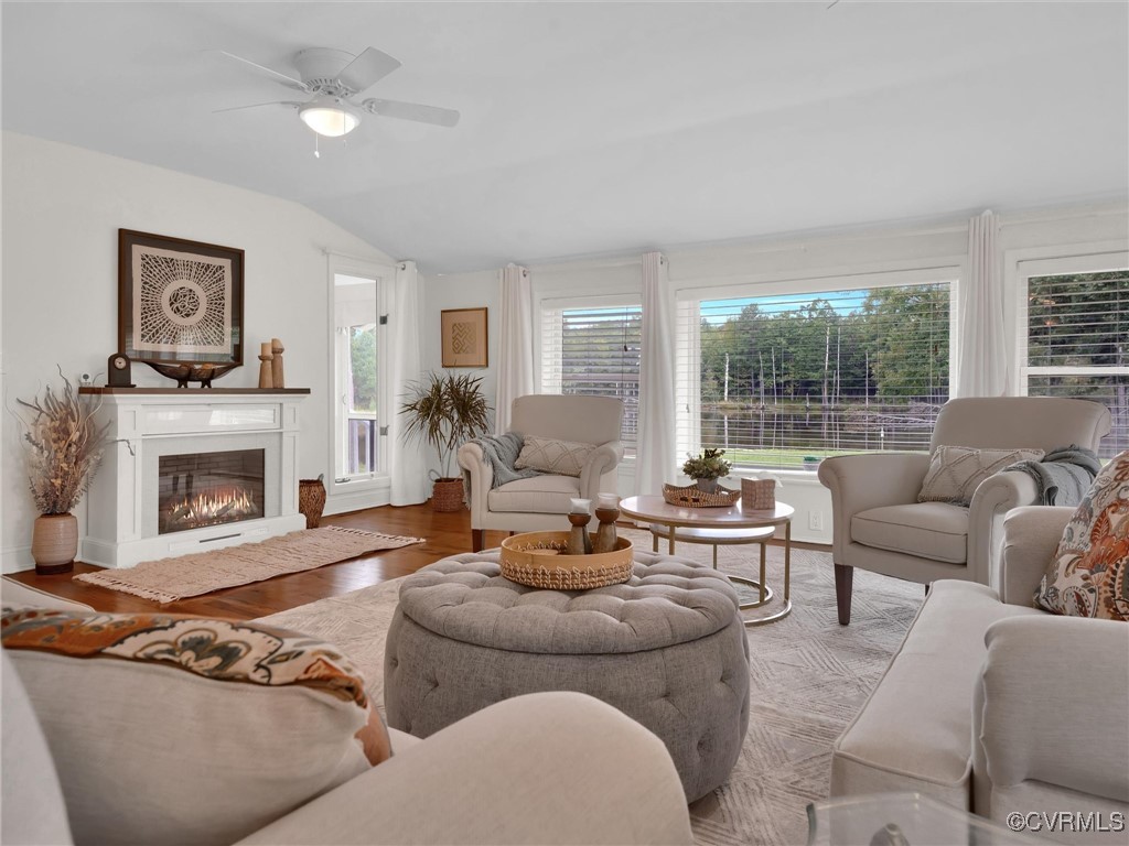727 Eanes Road Kenbridge, VA 23944 - Photo 9 of 50 a living room with furniture and a fireplace