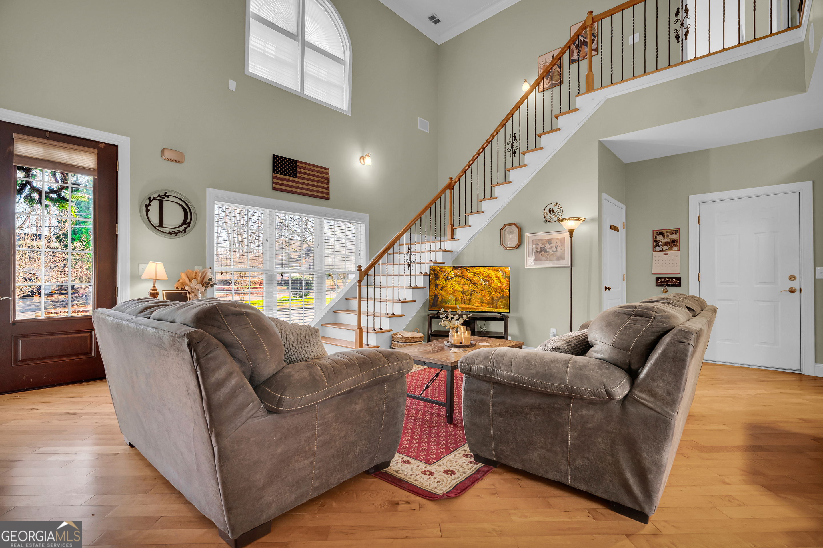 141 Shadow Walk Drive Mount Airy, GA 30563 - Photo 11 of 65 a living room with furniture and a large window