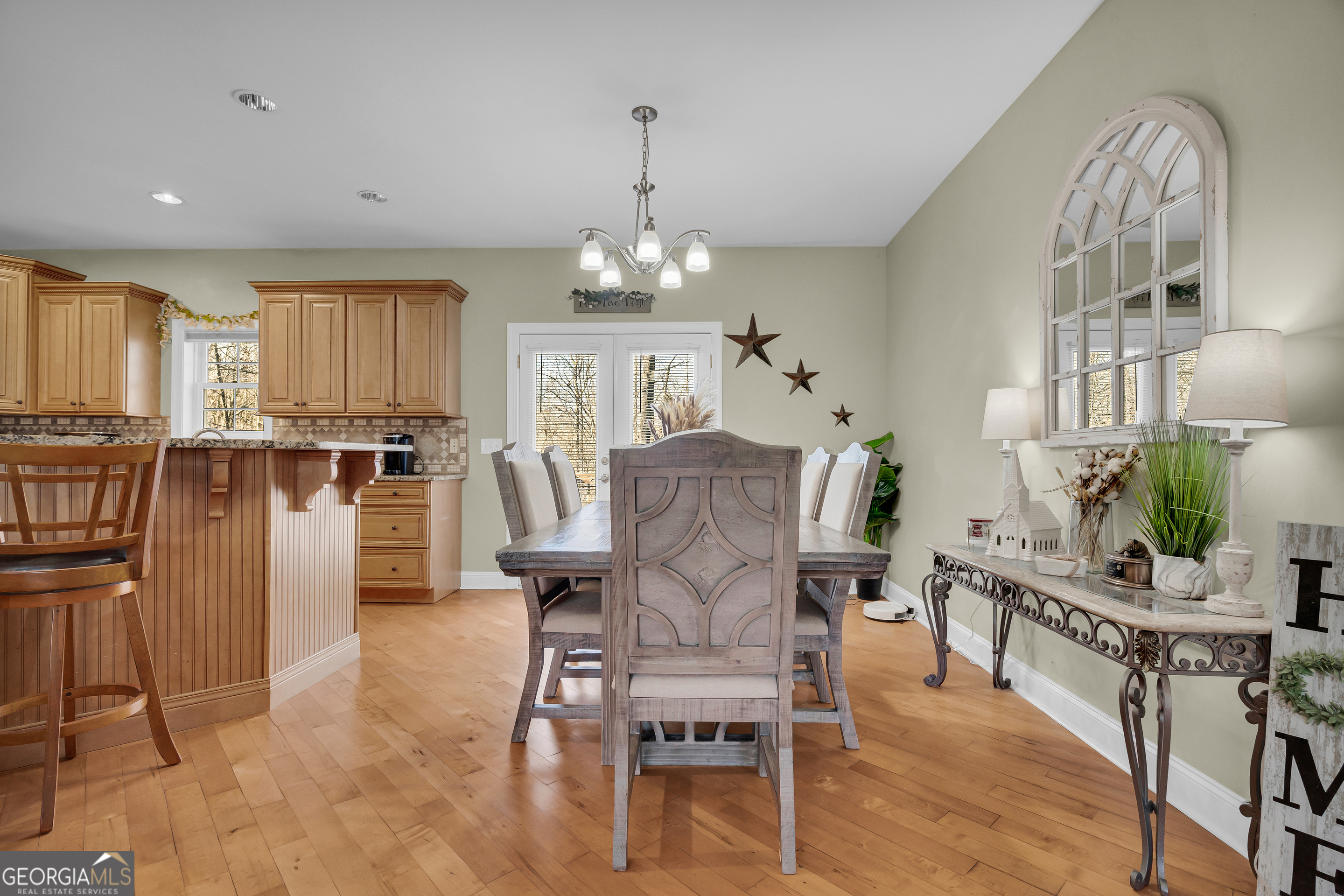 141 Shadow Walk Drive Mount Airy, GA 30563 - Photo 13 of 65 a view of a dining room with furniture and wooden floor