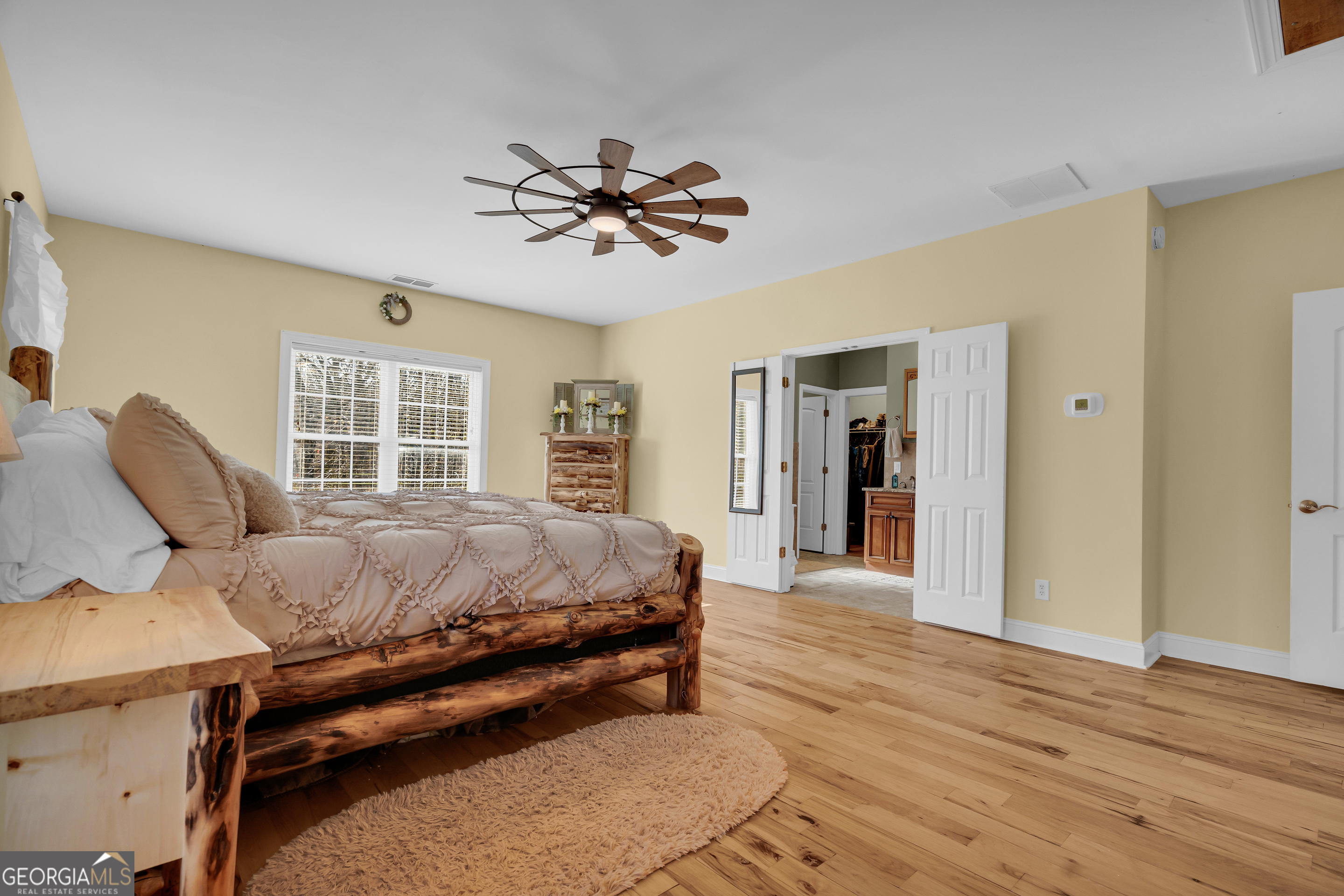 141 Shadow Walk Drive Mount Airy, GA 30563 - Photo 29 of 65 a bed room with a bed and a window