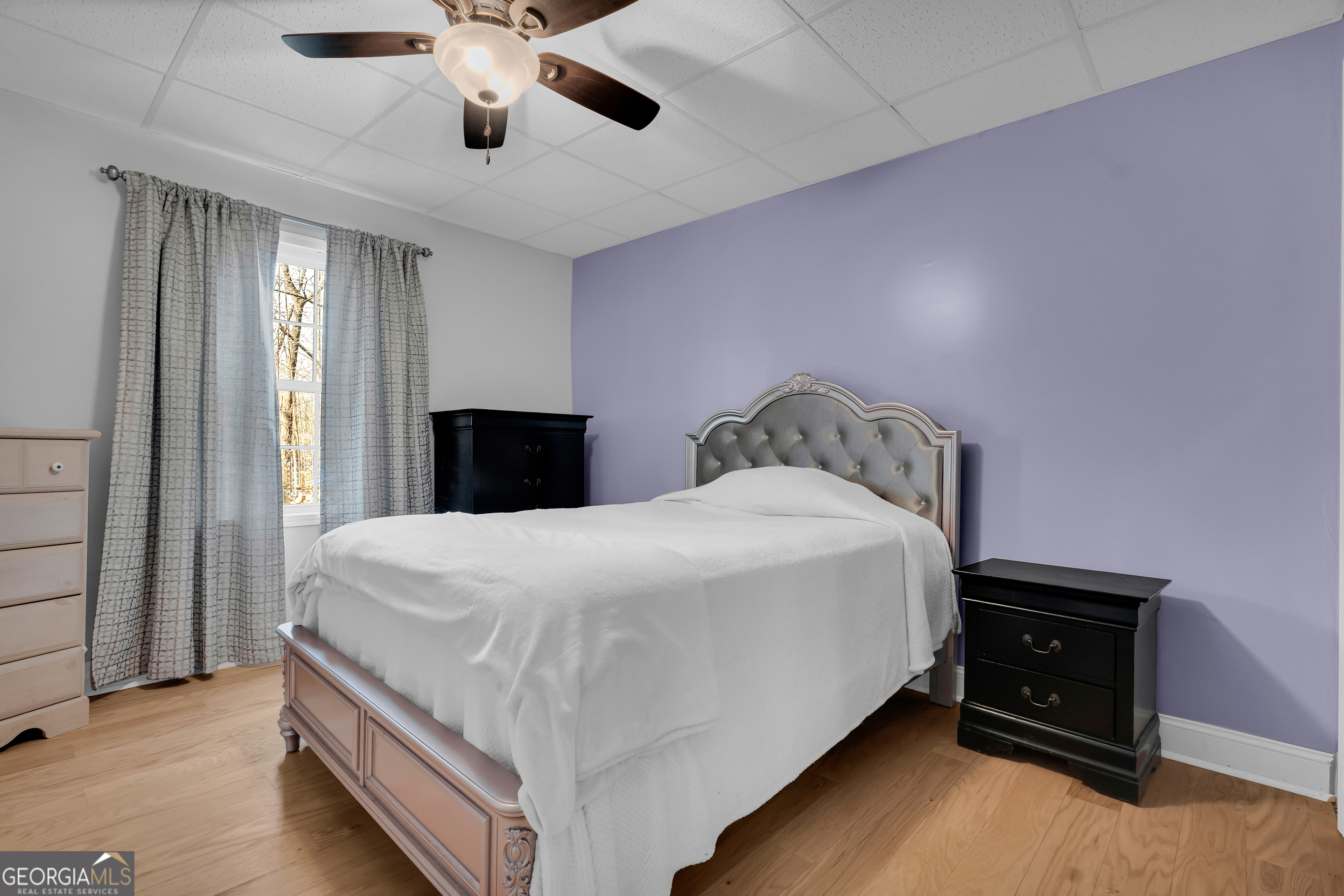 141 Shadow Walk Drive Mount Airy, GA 30563 - Photo 45 of 65 a bedroom with a bed and a dresser