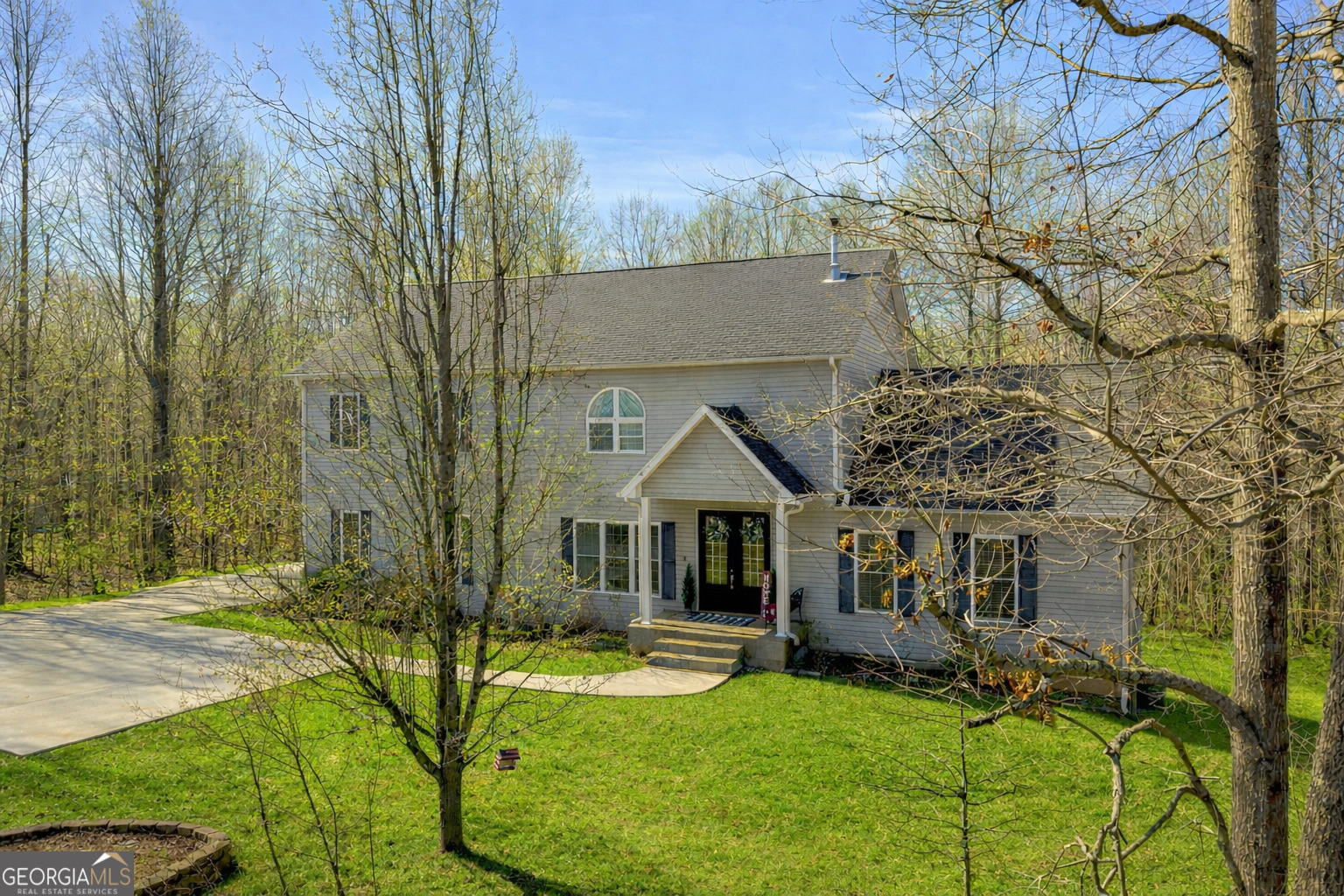 141 Shadow Walk Drive Mount Airy, GA 30563 - Photo 62 of 65 a front view of a house with yard