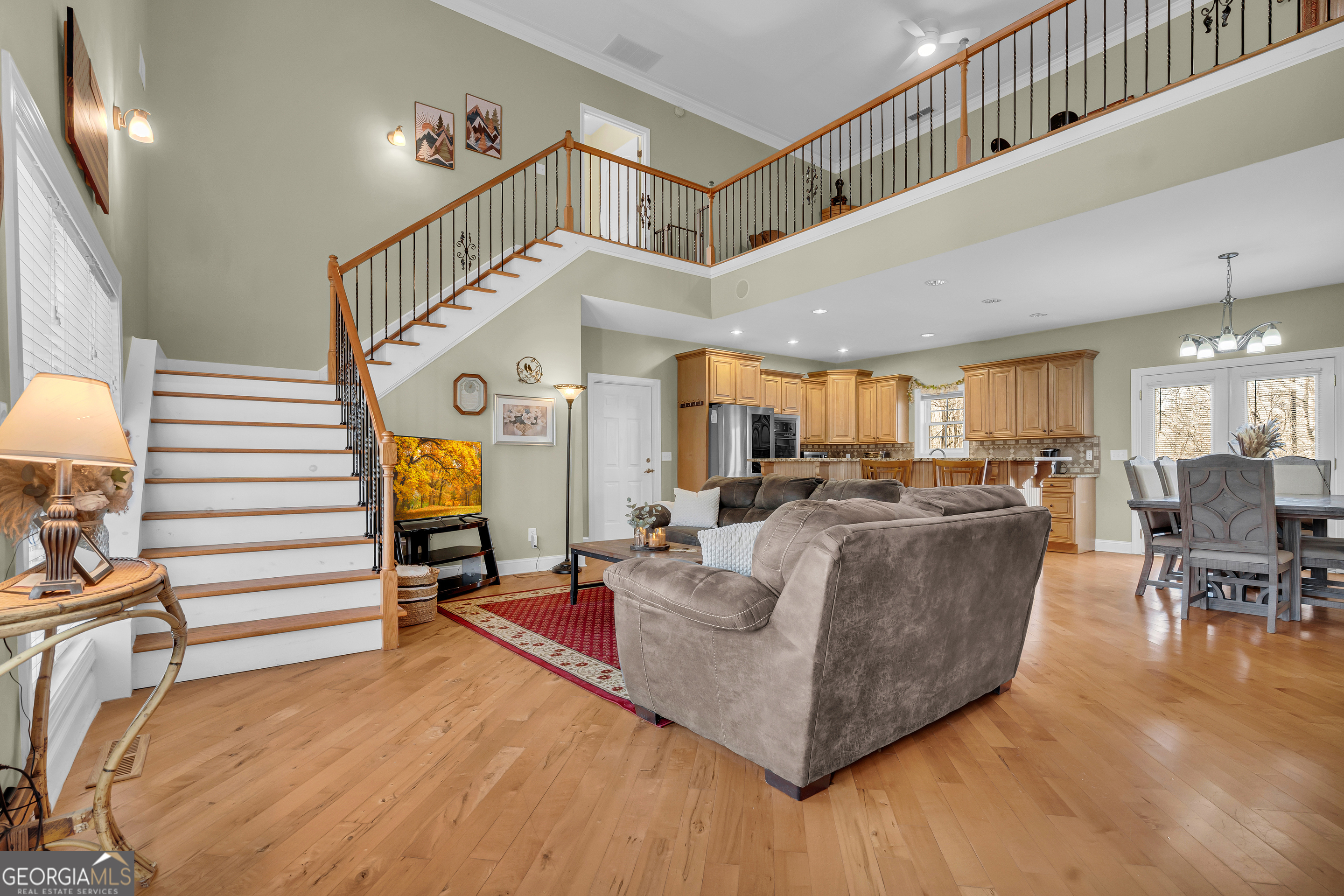 141 Shadow Walk Drive Mount Airy, GA 30563 - Photo 8 of 65 a living room with furniture kitchen view and a large window