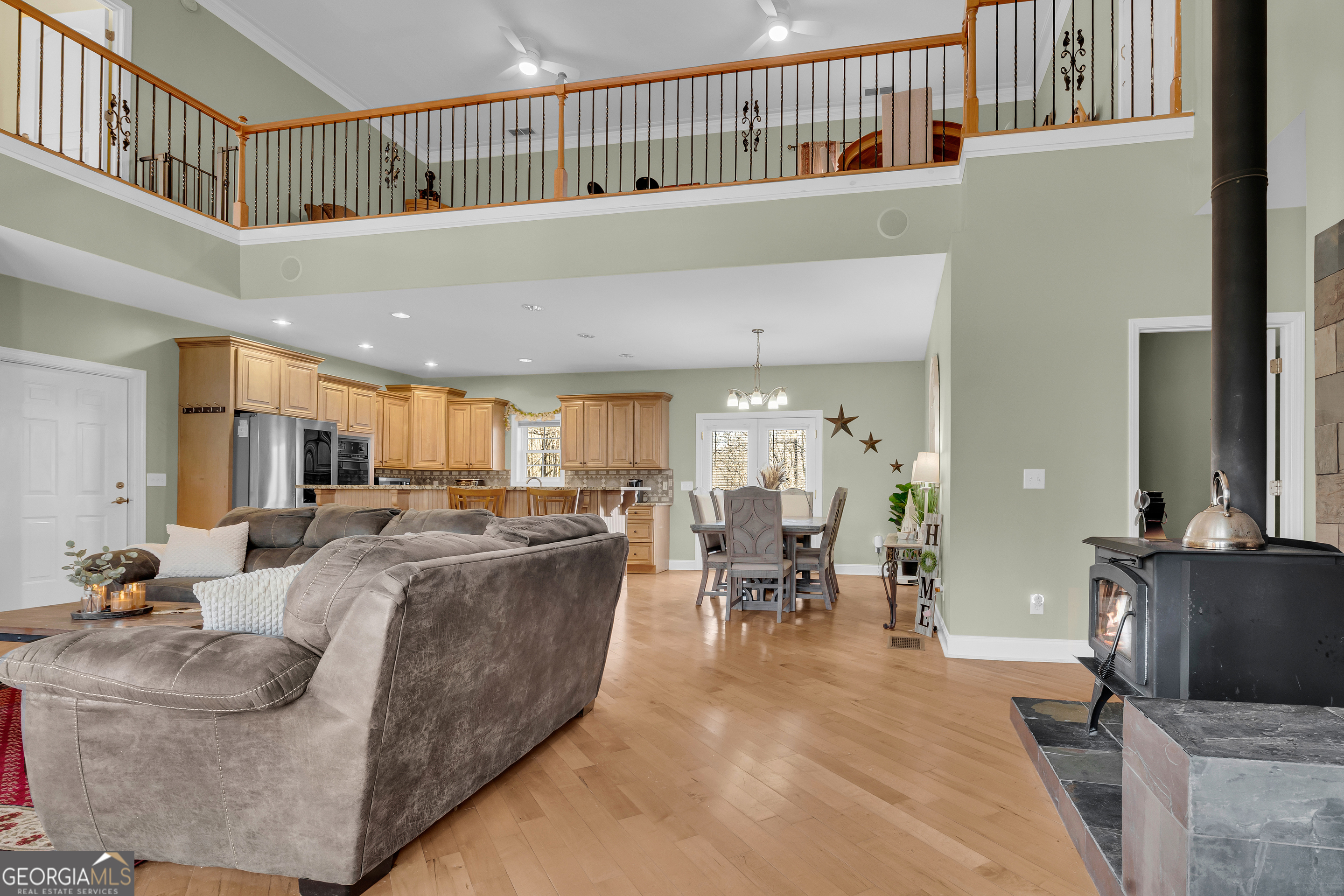 141 Shadow Walk Drive Mount Airy, GA 30563 - Photo 9 of 65 a living room with furniture and a dining table