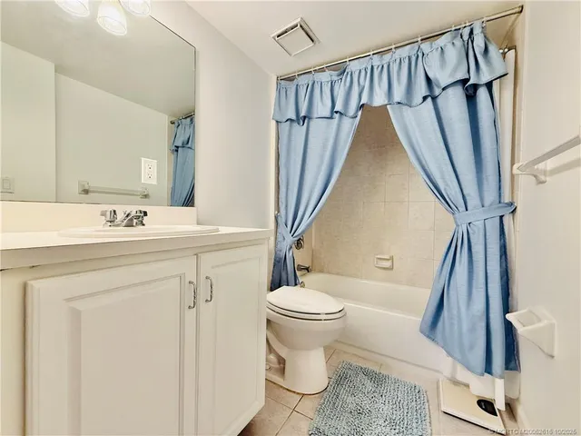 a bedroom with a bed and a closet