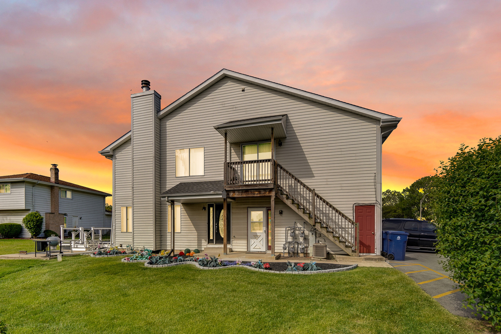 103 Red Barn Road, Unit 103 Matteson, IL 60443 - Photo 17 of 17 a front view of a house with a yard